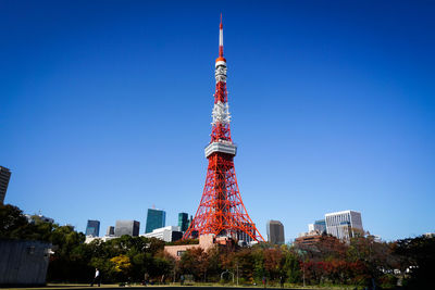 Low angle view of buildings against blue sky