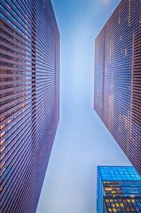 Low angle view of modern buildings against sky