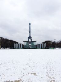 View of tower in city during winter