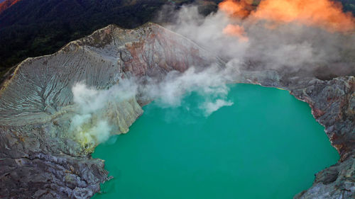 Aerial view of lake amidst mountains