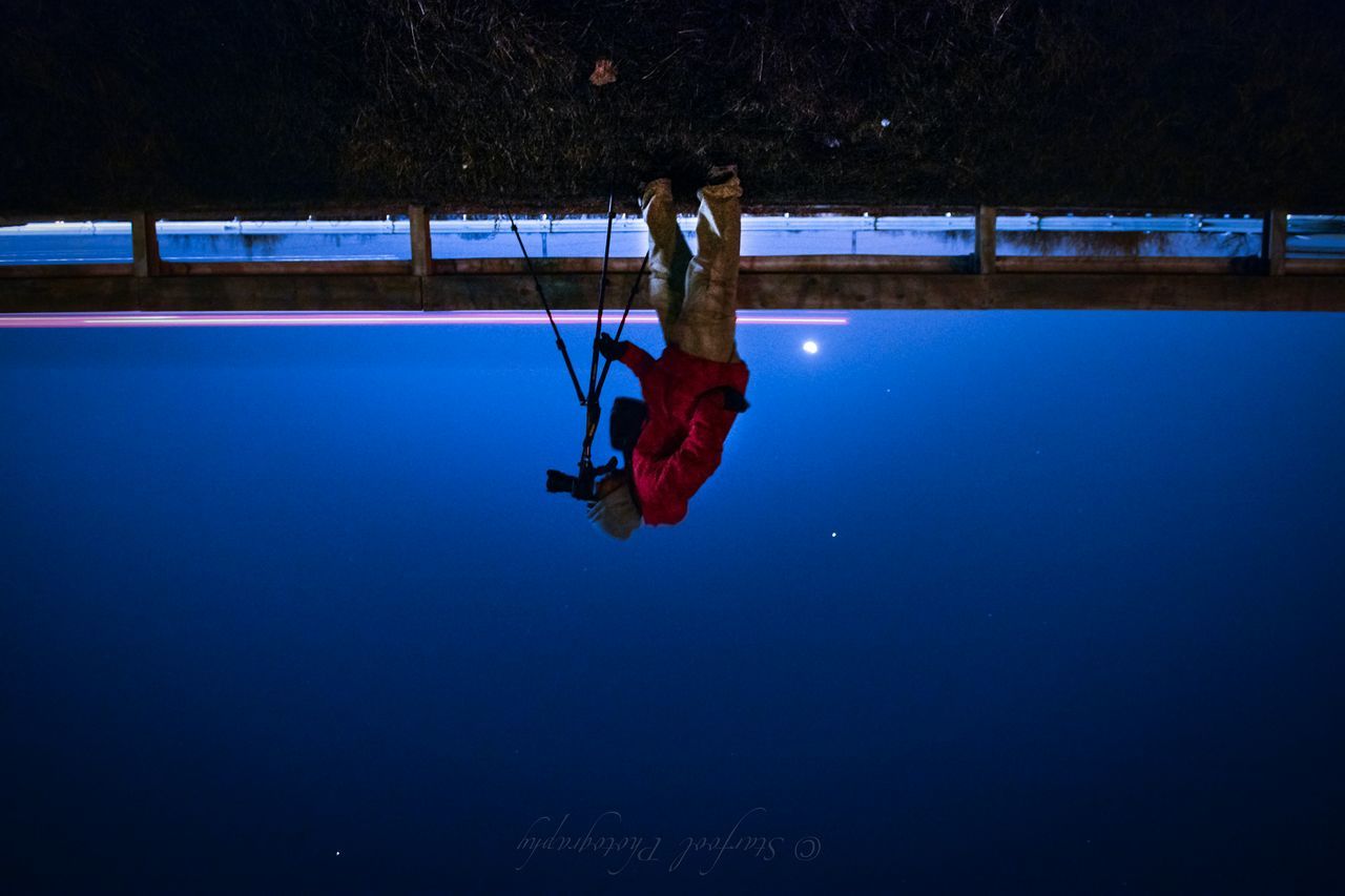 water, lifestyles, leisure activity, full length, men, blue, waterfront, sea, standing, person, rear view, reflection, transportation, indoors, day, nautical vessel, copy space, swimming pool