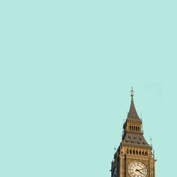 Low angle view of clock tower against sky