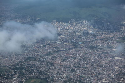 High angle view of illuminated city buildings