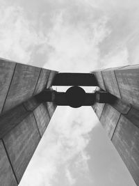 Low angle view of building against cloudy sky