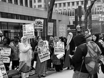 People protesting against buildings in city