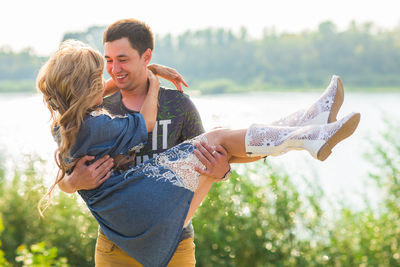 Young couple kissing outdoors