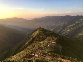 Scenic view of mountains against sky during sunset