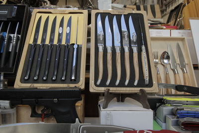 Close-up of objects in row for sale