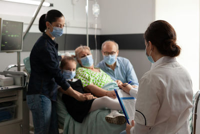 Group of people sitting in hospital