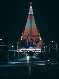 View of traffic on road at night