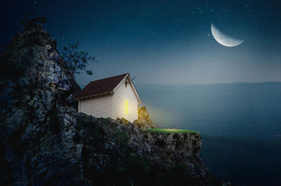 Low angle view of building against sky at night