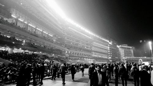 Crowd in city at night