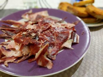 High angle view of meat in plate on table