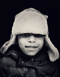 Portrait of boy in snow