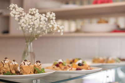 Close-up of food in plates on table