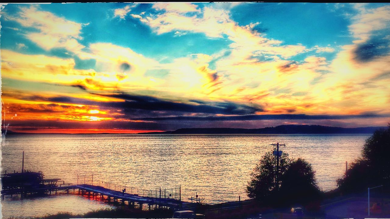 sky, sunset, cloud - sky, water, scenics, sea, tranquil scene, beauty in nature, cloudy, tranquility, cloud, beach, orange color, horizon over water, nature, idyllic, reflection, dramatic sky, shore, weather