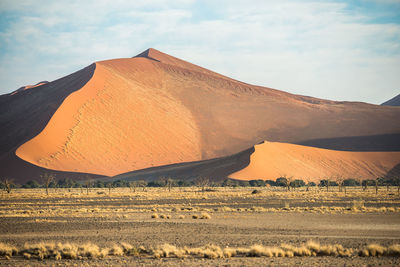 Scenic view of desert against sky