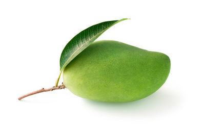 Close-up of fruit against white background