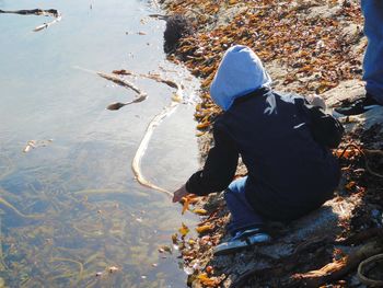 Rear view of man in lake
