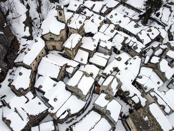 High angle view of frozen trees on snow covered field