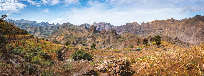 Panoramic view of landscape and mountains against sky