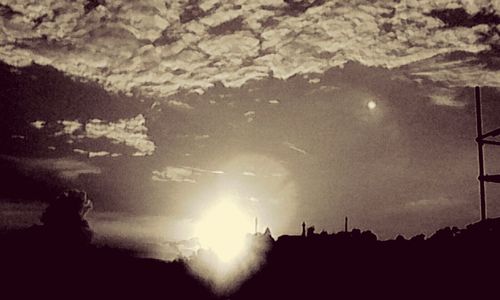 Sun shining through clouds