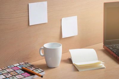 Close-up of coffee cup on table