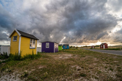 House on field against sky