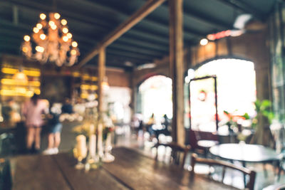 Defocused image of illuminated restaurant