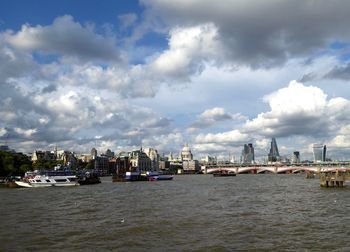 View of city against cloudy sky