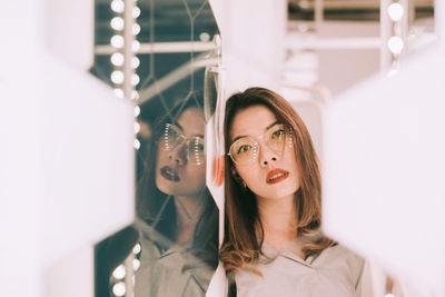 Portrait of young woman looking up