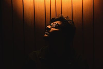 Portrait of young man looking away