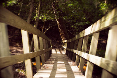 Footbridge with railings in background
