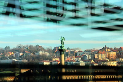 Statue of buildings in city