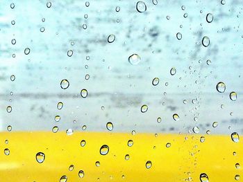 Close-up of water drops on glass