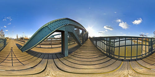 Bridge against sky on sunny day