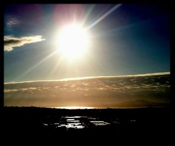 Sun shining through clouds