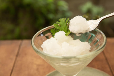 Close-up of ice cream in glass on table