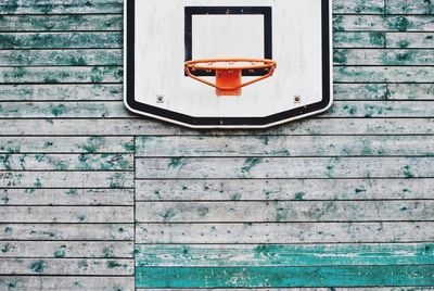 Basketball hoop on wooden wall