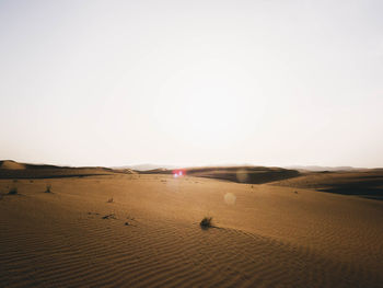 Scenic view of desert against clear sky