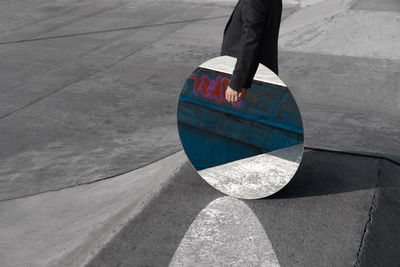 Low section of person on footpath