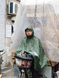 Portrait of young man standing outdoors