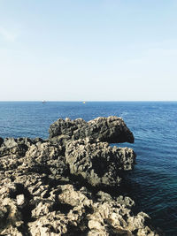 Scenic view of sea against clear sky