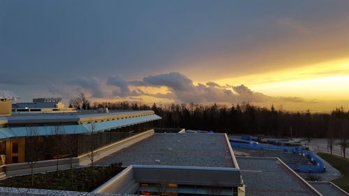 High angle view of cars against sky during sunset