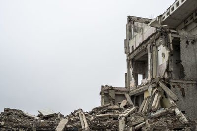 Low angle view of old building against sky