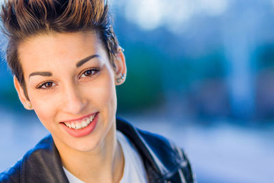 Portrait of smiling young woman