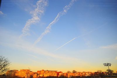 Low angle view of buildings against blue sky