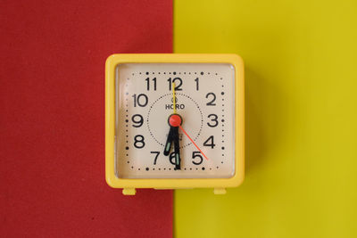 Close-up of clock on wall