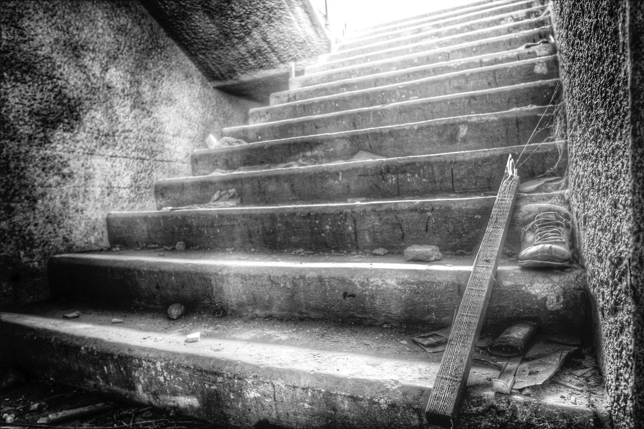 indoors, steps, old, close-up, metal, steps and staircases, heat - temperature, no people, abandoned, staircase, high angle view, obsolete, day, damaged, run-down, deterioration, fire - natural phenomenon, sunlight, metallic, industry