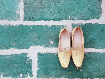 High angle view of shoes on wall